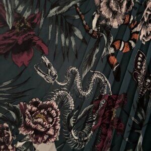 asymmetrical gotha skull , snake, flower , moth pleated skirt